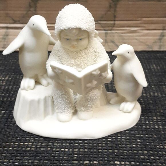 Department 56 Snowbabies "Read Me A Story" surrounded by penguins. - Picture 1 of 5